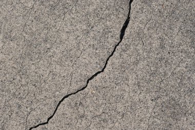 Los Angeles sokaklarında betonda çatlak. İç tasarım için arka plan.