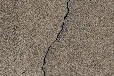 Los Angeles sokaklarında betonda çatlak. İç tasarım için arka plan.