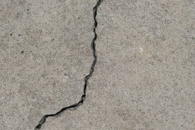 Los Angeles sokaklarında betonda çatlak. İç tasarım için arka plan.