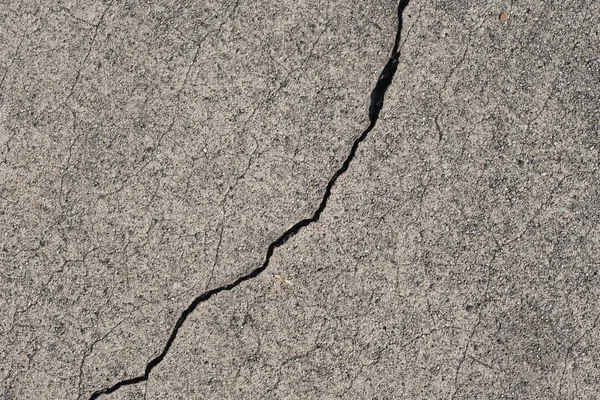 Los Angeles sokaklarında betonda çatlak. İç tasarım için arka plan.