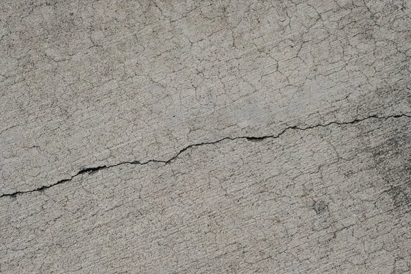 Los Angeles sokaklarında betonda çatlak. İç tasarım için arka plan.