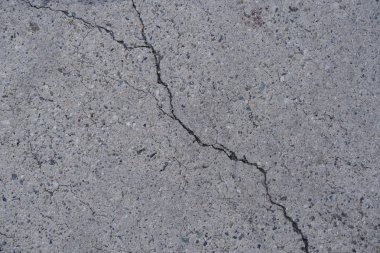 Los Angeles sokaklarında betonda çatlak. İç tasarım için arka plan.