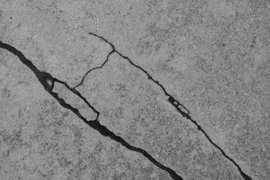 Los Angeles sokaklarında betonda çatlak. İç tasarım için arka plan.