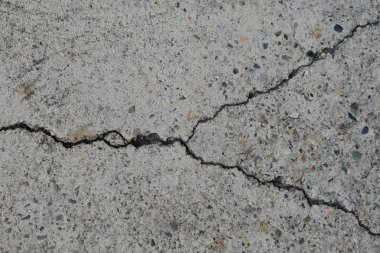 Los Angeles sokaklarında betonda çatlak. İç tasarım için arka plan.