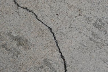 Los Angeles sokaklarında betonda çatlak. İç tasarım için arka plan.