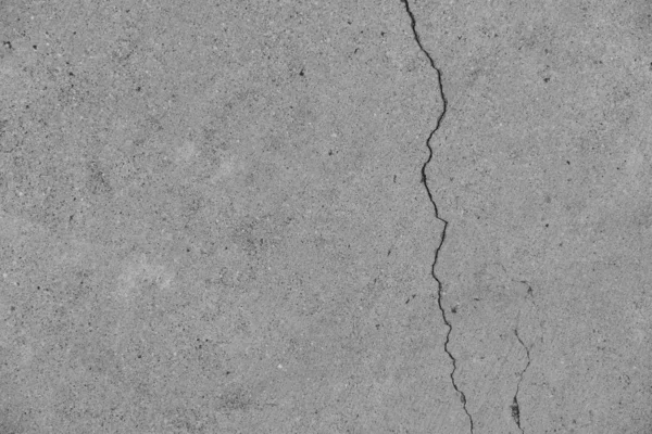 Crack in concrete on the streets of Los Angeles. Background for interior design.