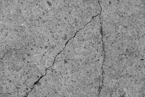 Crack in concrete on the streets of Los Angeles. Background for interior design.