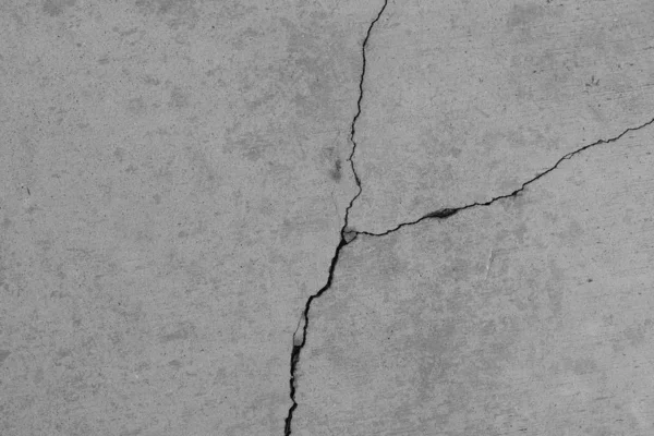 Crack in concrete on the streets of Los Angeles. Background for interior design.