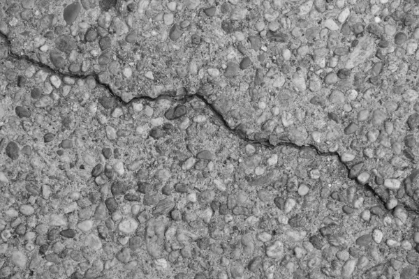 Crack in concrete on the streets of Los Angeles. Background for interior design.