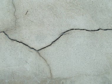 Los Angeles sokaklarında betonda çatlak. İç tasarım için arka plan.