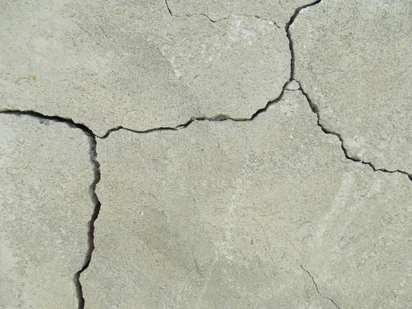 Crack in concrete on the streets of Los Angeles. Background for interior design.