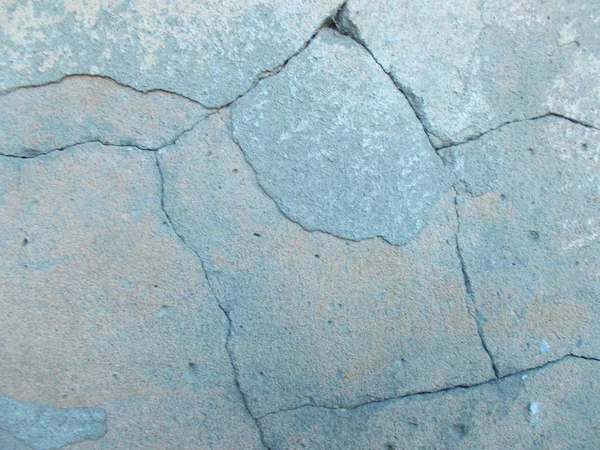 Crack in concrete on the streets of Los Angeles. Background for interior design.