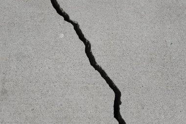 Los Angeles sokaklarında betonda çatlak. İç tasarım için arka plan.