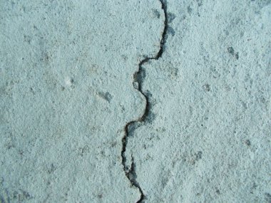 Los Angeles sokaklarında betonda çatlak. İç tasarım için arka plan.