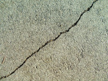 Los Angeles sokaklarında betonda çatlak. İç tasarım için arka plan.