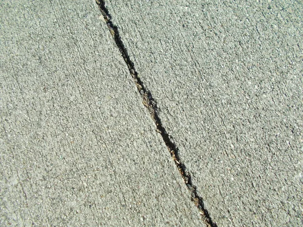 ロサンゼルスの路上でコンクリートに亀裂 インテリアデザインの背景 — ストック写真