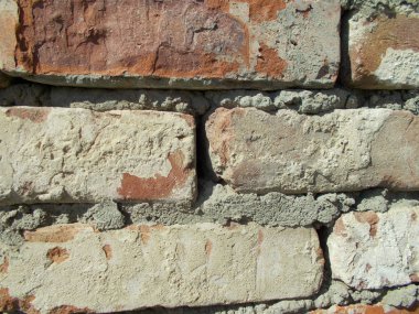 Tuğla. Duvar tuğladan yapılmıştır. Tasarım için arka plan.