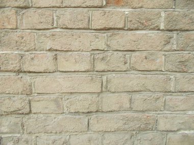 Tuğla. Duvar tuğladan yapılmıştır. Tasarım için arka plan.