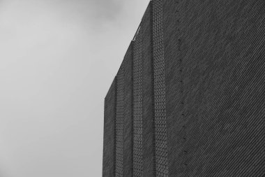 Binanın cephesinin ayrıntıları ve elemanları. Şehrin mimarisi. Tasarım için arka plan görüntüsü.