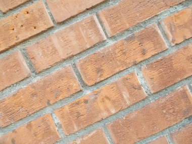Bir binanın duvarında tuğla işi. Tasarımınız için tuğla duvar arkaplanı resmi.