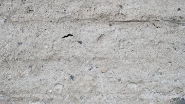 Eski bir beton çitin yüzeyi. Web tasarımı için arkaplan resmi.