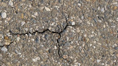 Duvarın beton yüzeyi. Çatlak. Web tasarımı için arkaplan resmi.