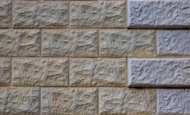 Duvardaki gri pürüzlü fayanslar. arkaplan dokusu.