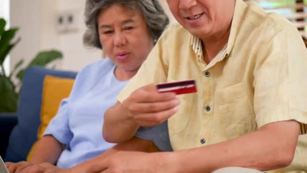 Asian Senior Couple Using Laptop Searching Online Shopping Sharing Social — Stock Video