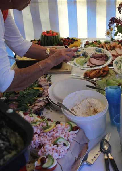 A table with buffet food at a student party in sweden.