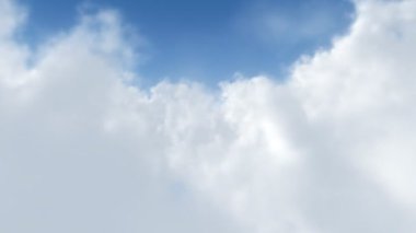 Bulutların arasından pürüzsüz bir döngü uçuşu , güneşli bir günde güçlü bir rüzgarla uçan kümülüs bulutlarıyla gökyüzünü fotoğraflamak