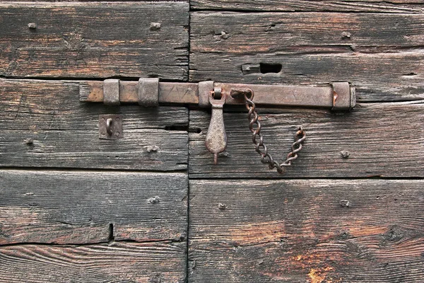 Close Old Wooden Door Closed Rusty Iron Bolt — Stock Photo, Image