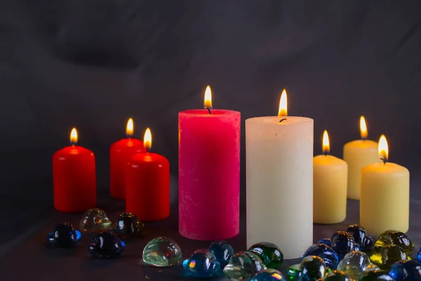 Thin Wax Candle Small Lit Flame Background Candles Old Table — Stock Photo, Image