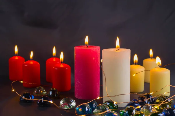 Thin Wax Candle Small Lit Flame Background Candles Old Table — Stock Photo, Image
