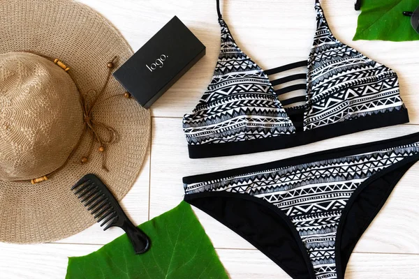 tropical summer flat lay with indian swimsuit