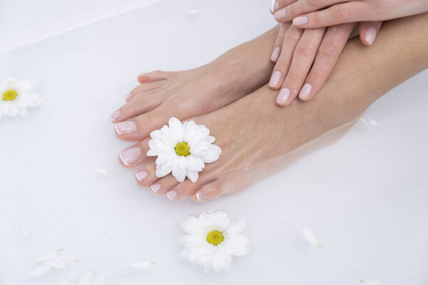 Beautiful female legs and feet in the bath.