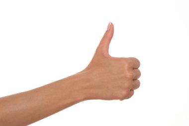 Feamle hand showing thumb up. clipart