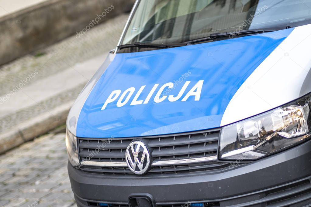 The logo of municipal police on police car.