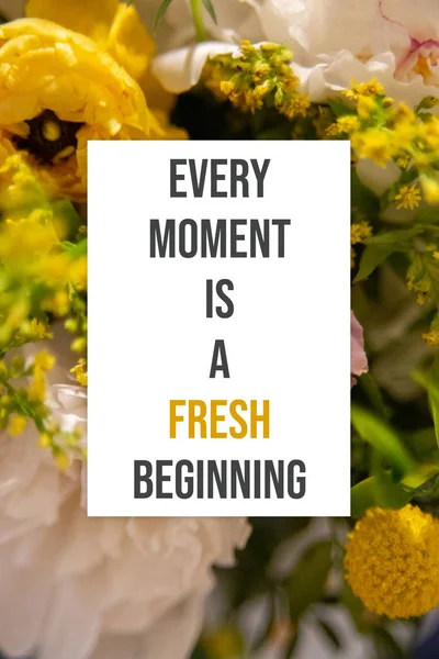 Floral motivational poster with inspirational quote of the day - Every moment is a fresh beginning