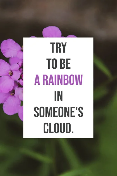 Floral motivational poster with inspirational quote of the day - try to be a rainbow in someone\'s cloud