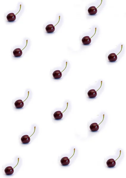 Cherry berries on a white background, pattern — Stock Photo, Image