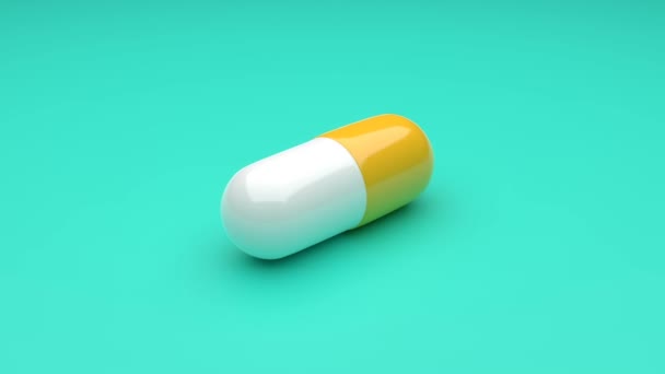 White Yellow Pills Isolated Rotating Green Background Seamless Looping Uhd — Stock Video