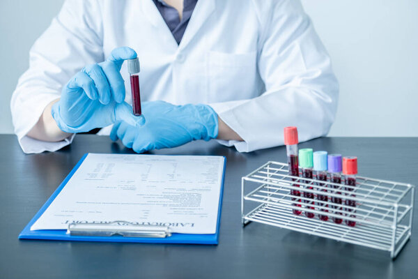 Professional doctors perform find virus tests from samples of blood tests to diagnose coronary virus infections analysis and sampling of infectious.