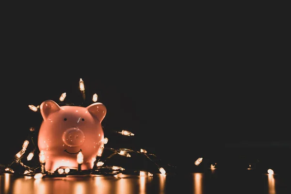 Piggy bank with party light, organize a party for the event were successful in saving money for use in various festivals.