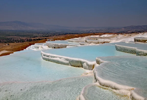 Travertines in Turkey. Limestone is deposited by hot springs and — Stock Photo, Image
