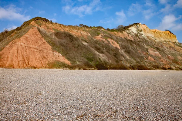 Sandstensklipporna på Juraeran stiger från Salcombe Regis Beach — Stockfoto