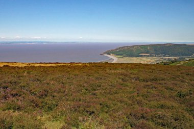 View of Exmoor National park and the Bristol Channel near Minehead in Somerset, England. clipart