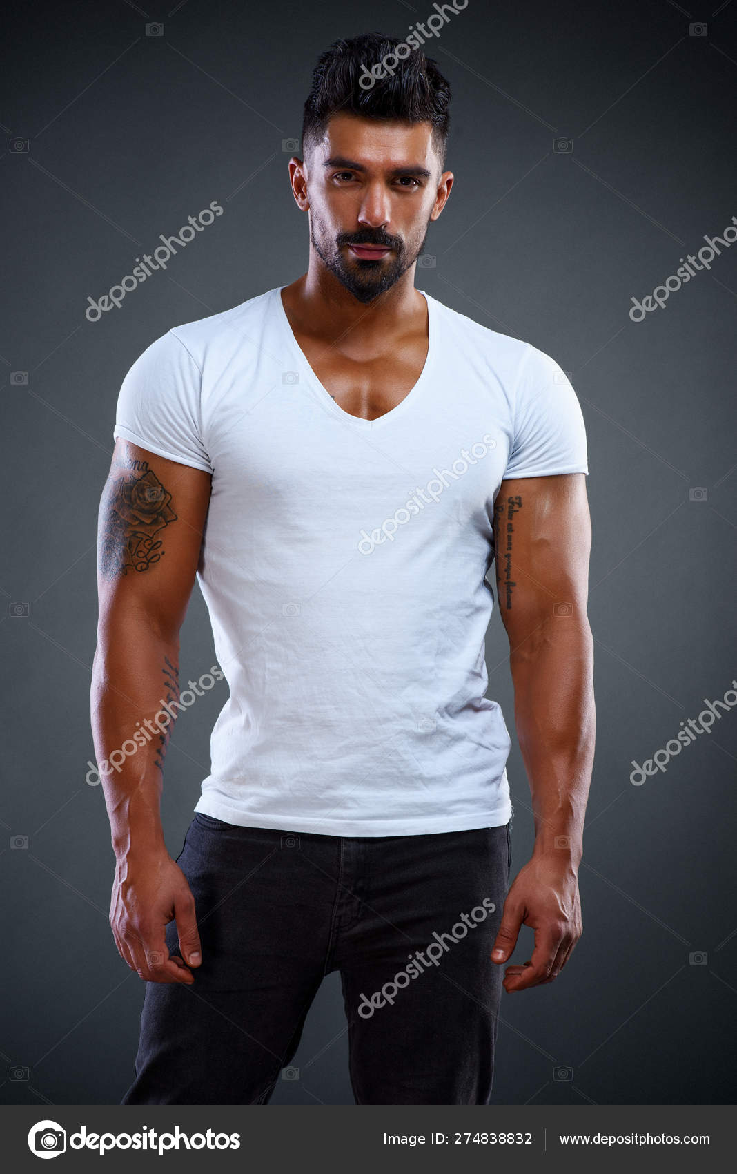 Handsome Male Fitness Model Wearing Jeans and White T-Shirts Stock ...