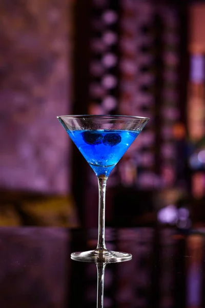 Sapphire Martini Cocktail on the Bar Counter