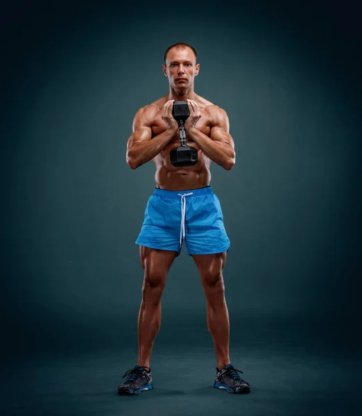 Muscular Men Performing Leg Exercises With Dumbbell