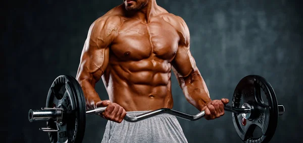 Muscular Men Lifting Weights. Tiro de estudio —  Fotos de Stock